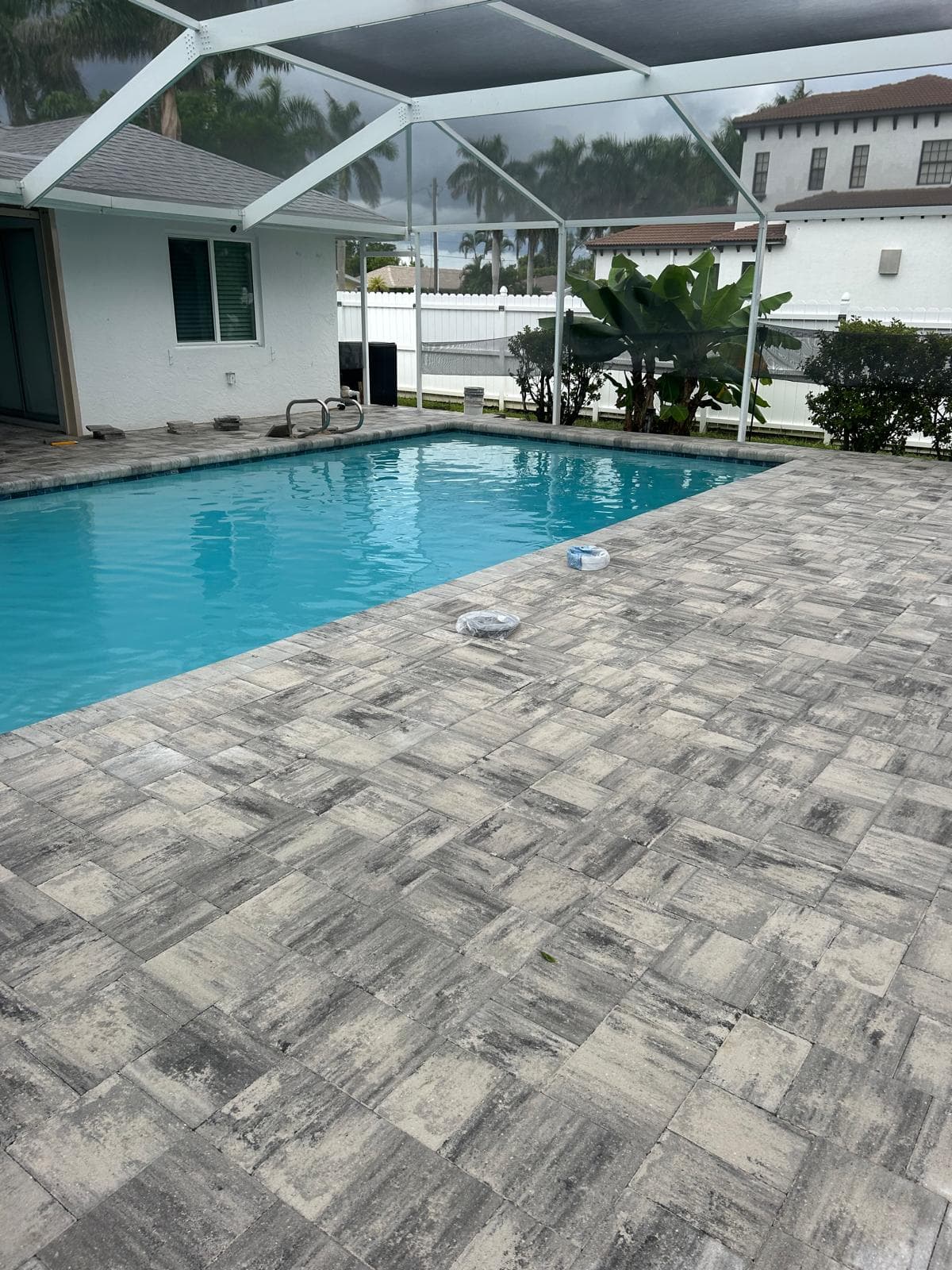 Pool deck paver installation